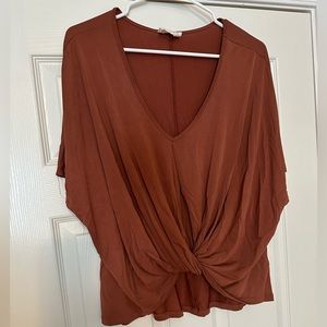 Lightly worn Burnt orange knotted top